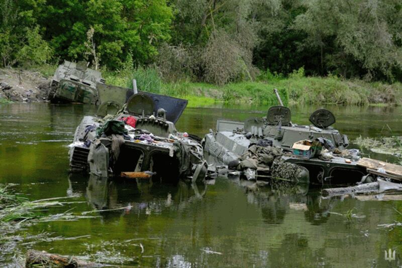 Armored fighting vehicles abandoned by Russian soldiers are seen during a counteroffensive operation of the Ukrainian Armed Forces amid Russia's attack on Ukraine in Kharkiv region, Ukraine, in this handout picture released Sept. 11, 2022. Credit: Press service of the Commander-in-Chief of the Armed Forces of Ukraine via Reuters