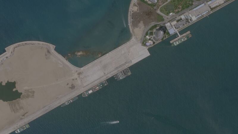 Chinese ships in port at Sanya, April 3, 2020. The ship in the lower left of the harbor is the Hai Yang Di Zhi 8, the survey vessel currently carrying out operations within Malaysia's waters.