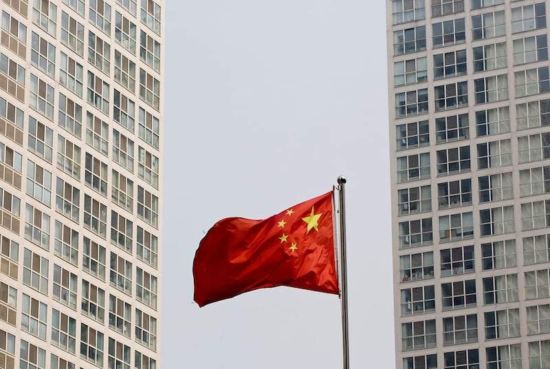 中国审计署发布工作报告,有70个地区以“自卖自买”国有资产、虚构土地交易等方式,虚增财政收入860亿余元。(美联社资料图片)