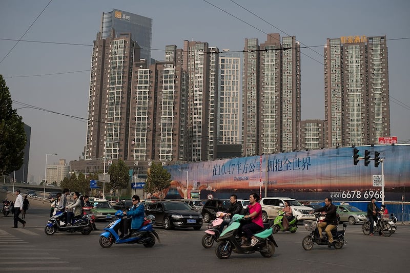 有经济学者认为,中国老百姓已对买房自住或投资失去信心,以“零门槛落户”这招救楼市恐怕只是地方政府一厢情愿。(法新社资料图片)