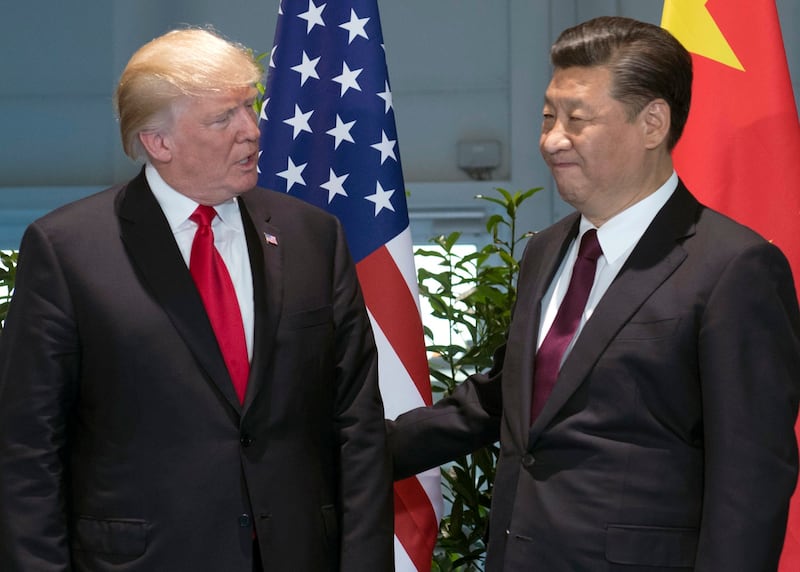 美国总统特朗普(左)和中国国家主席习近平在一起。(美联社)