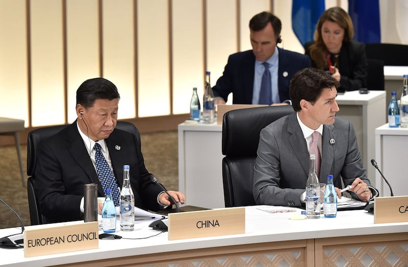 2019年6月29日,加拿大总理特鲁多(右)和中国国家主席习近平在日本大阪出席G20峰会。(路透社)