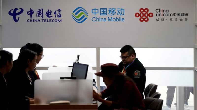 中国电信三巨头将被摘牌。(路透社)