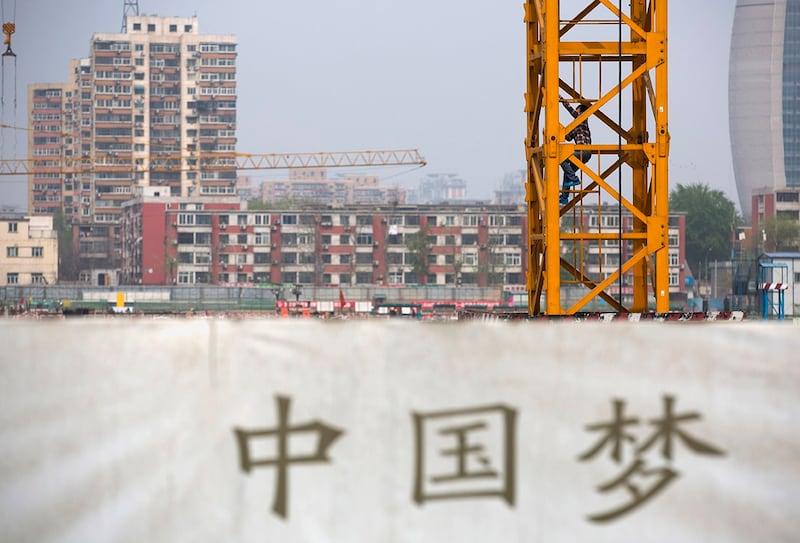 中国媒体第一财经周三发布的社论指,"让民营企业有感有得,将是一把经济重整的钥匙"。(美联社图片)